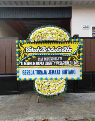 Papan Bunga Duka di Tuksono
